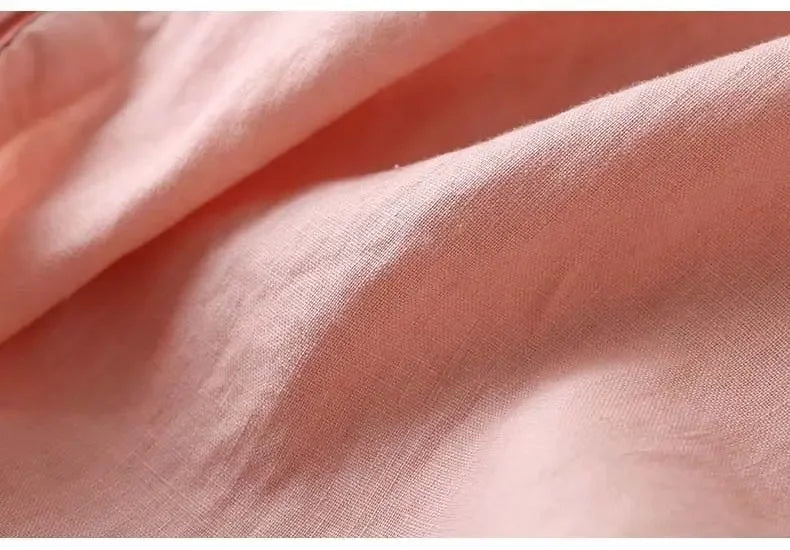 Pink patterned women's casual chic blouse, embroidered V-neck, soft fabric.