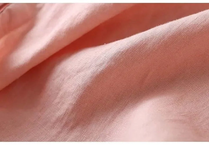 Pink patterned women's casual chic blouse, embroidered V-neck, soft fabric.