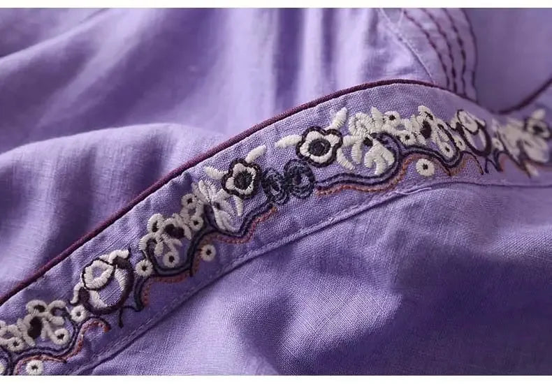 Elegant patterned women's blouse, V-neck, comfortable relaxed fit.