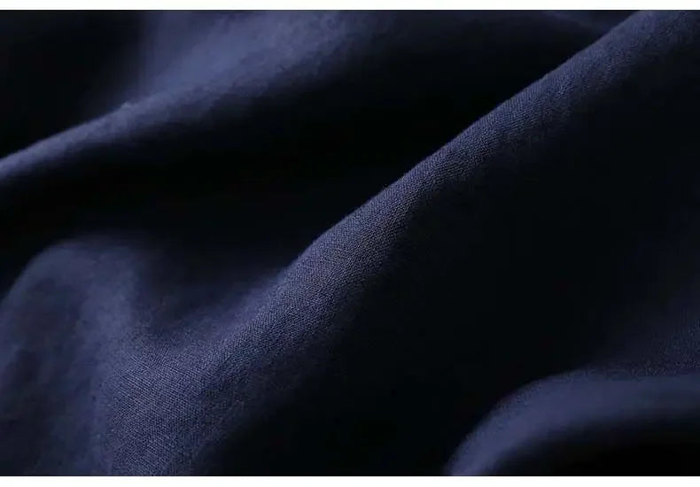 Navy blue patterned women's blouse, embroidered V-neck, ultimate comfort wear.