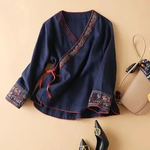 Comfortable embroidered patterned blouse, women's relaxed fit, chic style.