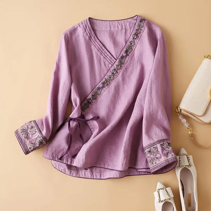Elegant embroidered women's blouse, patterned, relaxed fit for versatile style.