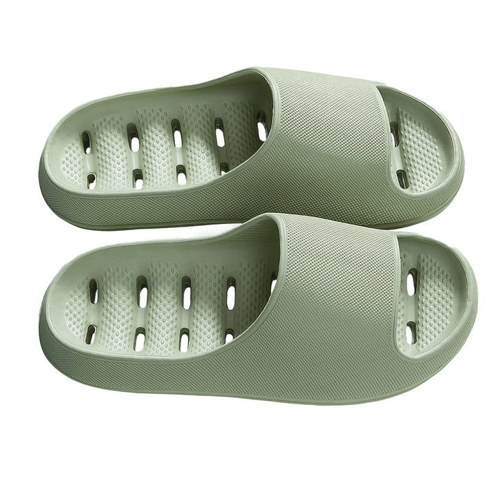 Lightweight women's open-toe shower slippers featuring quick-drain holes & non-slip sole for safety.