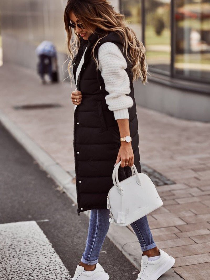 Women's quilted long bodywarmer vest, ideal for fall fashion, winter layering & stylish casual outerwear.
