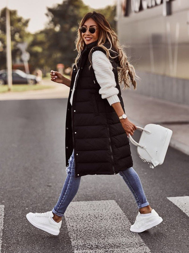 Comfortable women's long quilted bodywarmer vest, a versatile piece for fall & winter casual layering outfits.