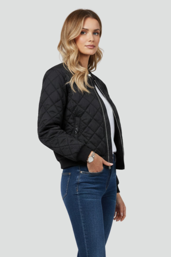 Stylish women's quilted zip jacket, a comfortable and versatile layering piece for everyday casual wear.