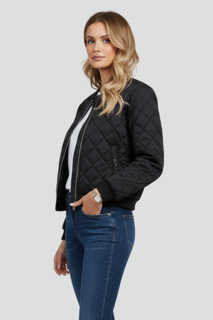 Lightweight women's quilted jacket with full zip, ideal for easy layering and everyday casual style.