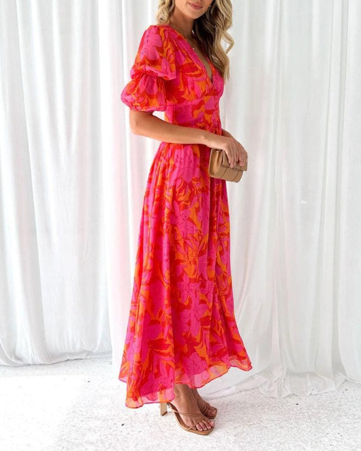 Elegant women's flowy maxi dress. Comfortable day-to-night V-neck summer dress with stylish puff sleeves.