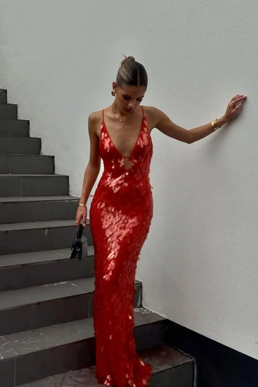 Women's red sequin mermaid homecoming dress with backless design, perfect for formal events.