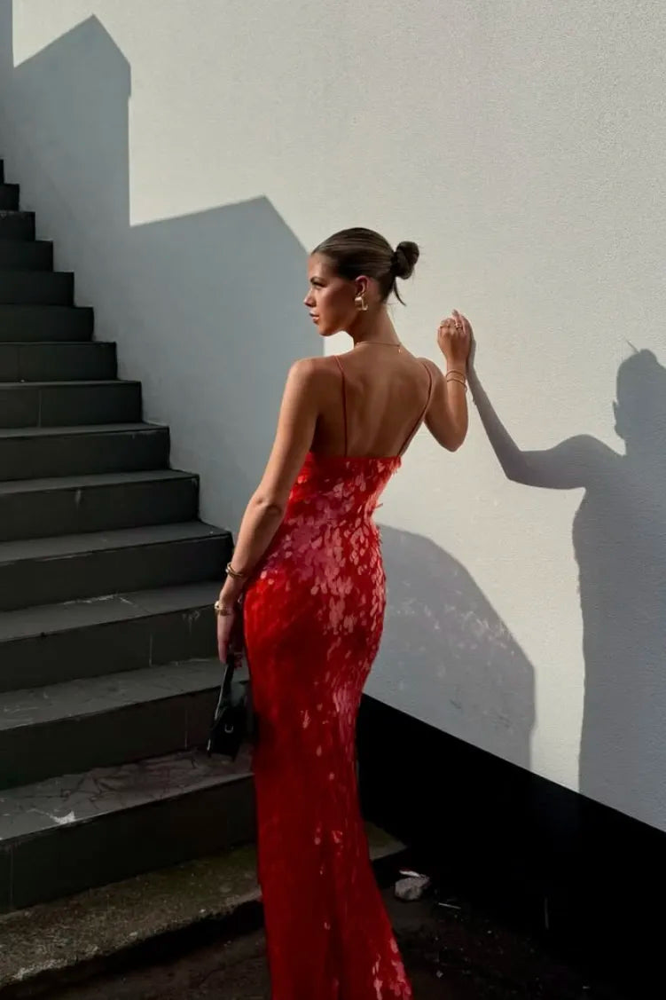 Stunning red sequin mermaid evening dress for women, featuring a chic backless cut and elegant silhouette.