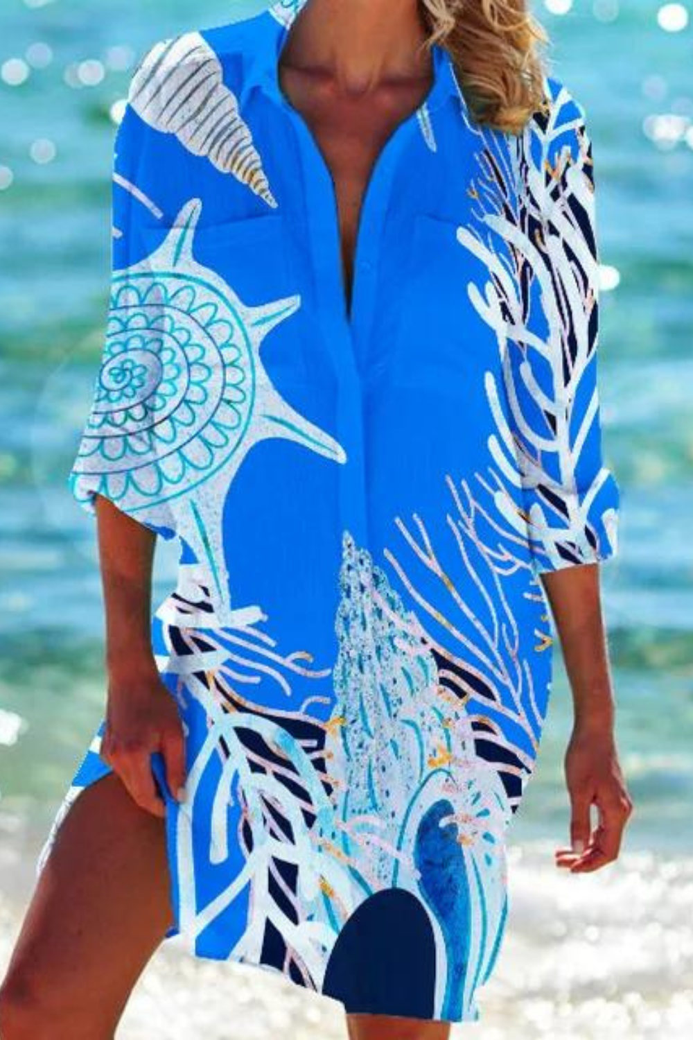 Women's relaxed beach cover up with vibrant seashell & coral print. Perfect for summer vacation & resort wear.