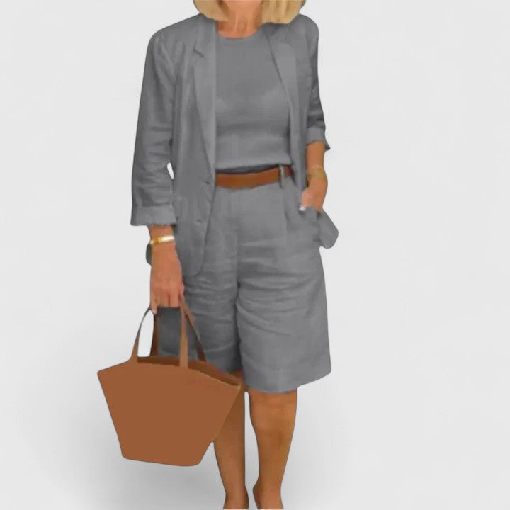 Elegant women's coordinated blazer & Bermuda shorts set. Relaxed fit summer outfit for a smart casual ensemble.