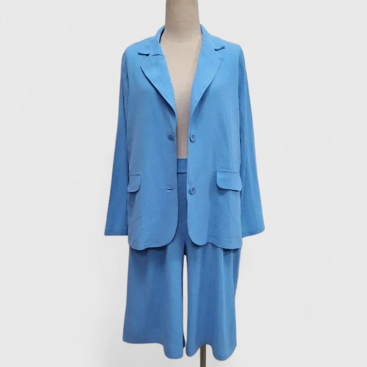 Vacation-ready women's blazer & Bermuda shorts coordinated set. Chic, relaxed fit summer outfit for outings.
