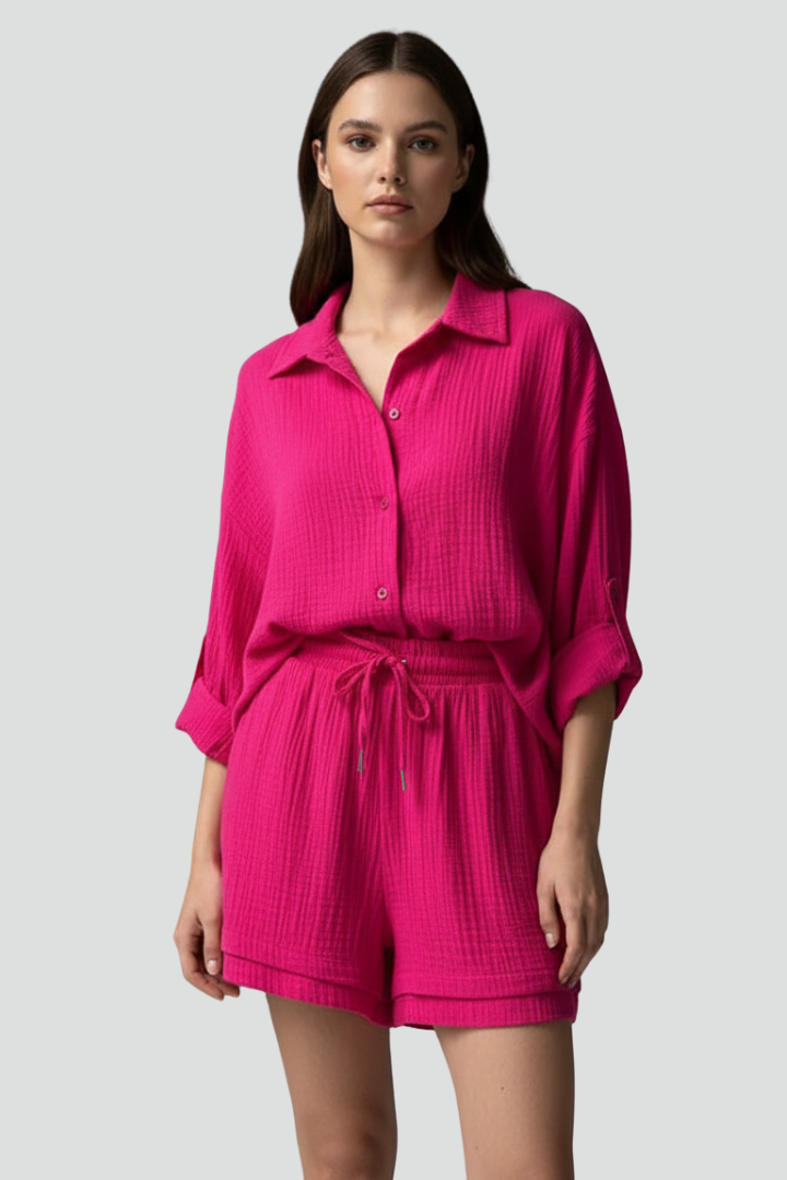 Chic women's spring/summer casual set: relaxed button-up long sleeve shirt & shorts.