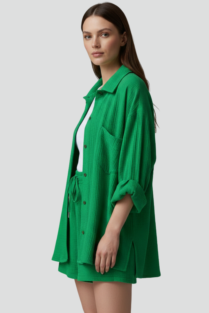 Comfortable women's relaxed fit two-piece shorts lounge set with a stylish button-up shirt.