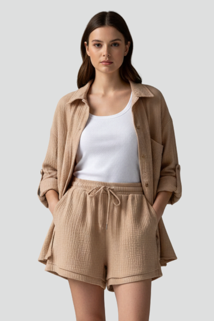 Soft & comfortable women's relaxed fit lounge set with long sleeve button-up top & shorts.