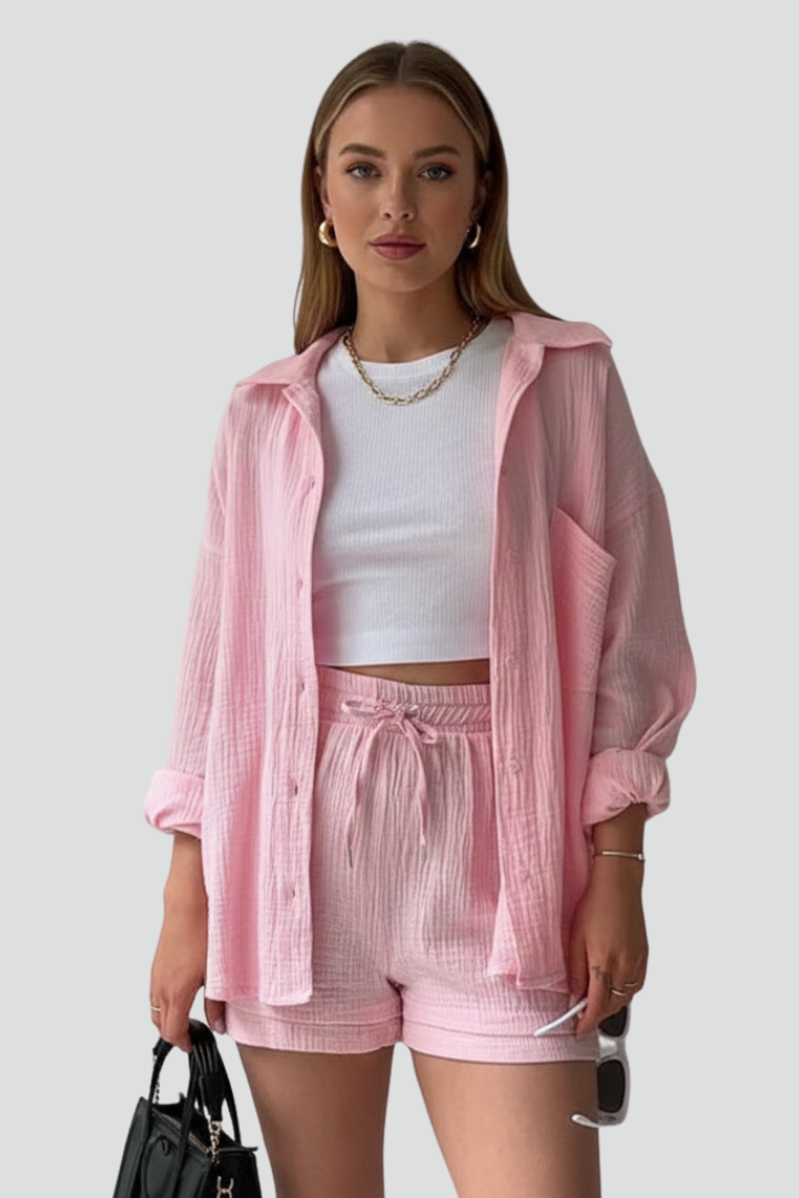 Women's comfortable relaxed button-up shirt and shorts two-piece lounge set.