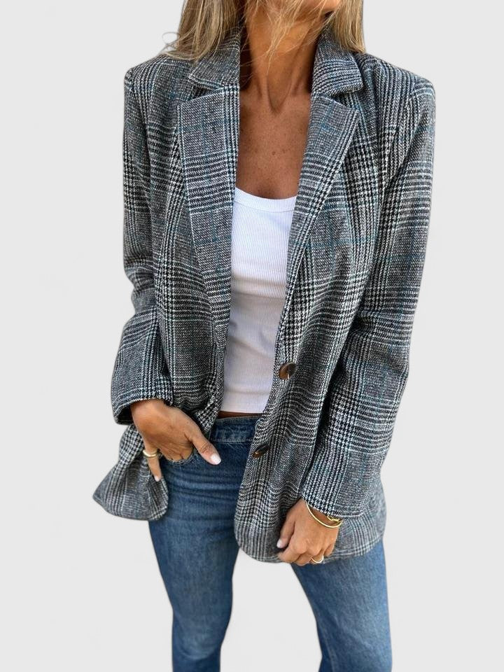 Stylish women's plaid boyfriend blazer in a relaxed fit. Chic oversized jacket for modern casual and workwear outfits.