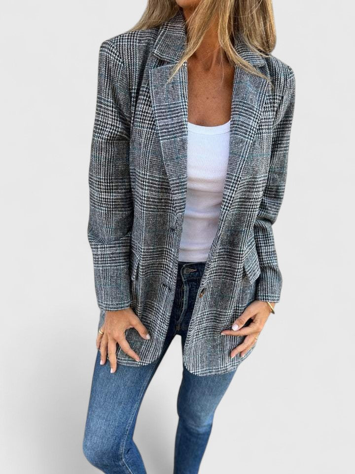 Relaxed fit plaid women's blazer, a trendy boyfriend style oversized jacket. Great for modern fashion and layering.