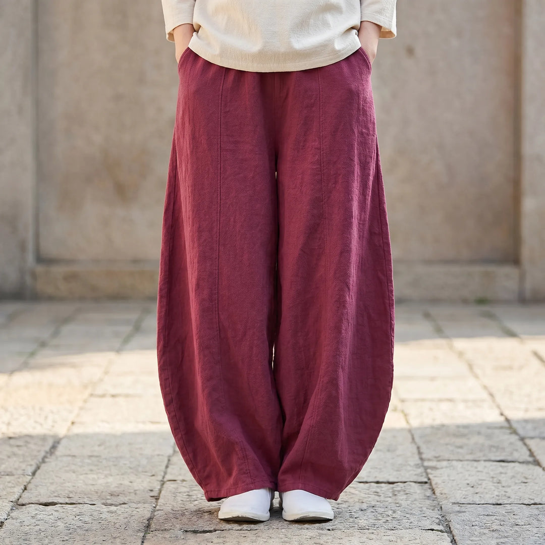 Women's relaxed fit barrel pants with wide leg and elastic waist for comfortable everyday style.