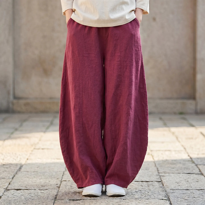 Women's relaxed fit barrel pants with wide leg and elastic waist for comfortable everyday style.