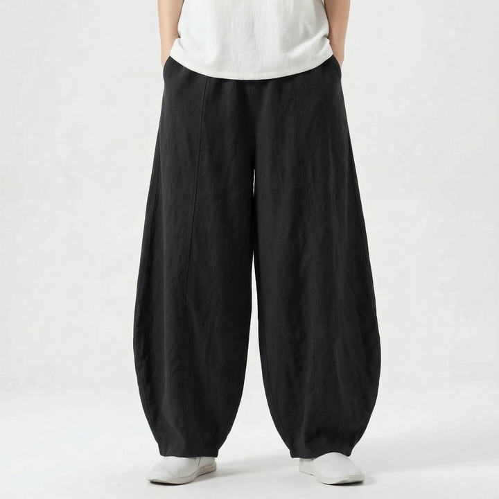 Flowy wide-leg women's barrel trousers, relaxed pull-on style ensures comfort for any occasion.