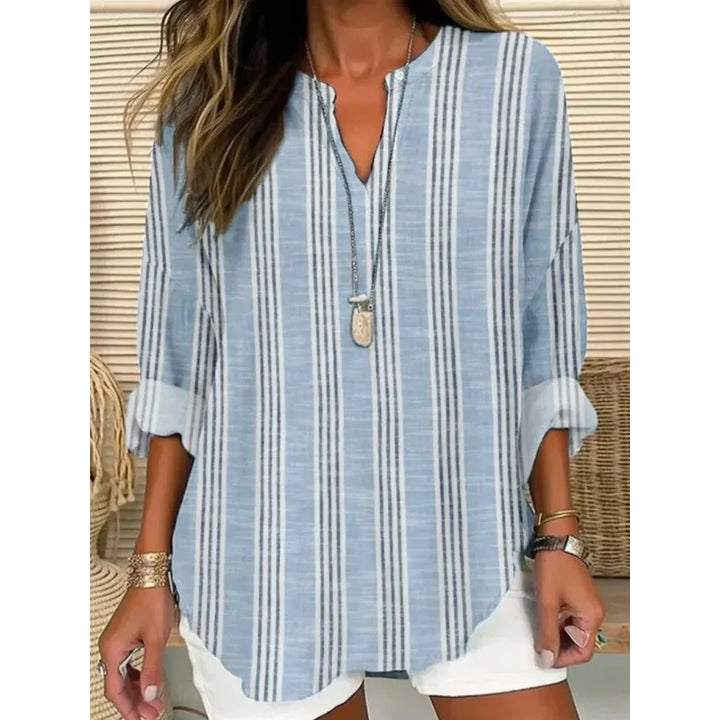 Women's relaxed fit blouse with a stylish split neck and three-quarter cuffed sleeves, perfect for casual wear.