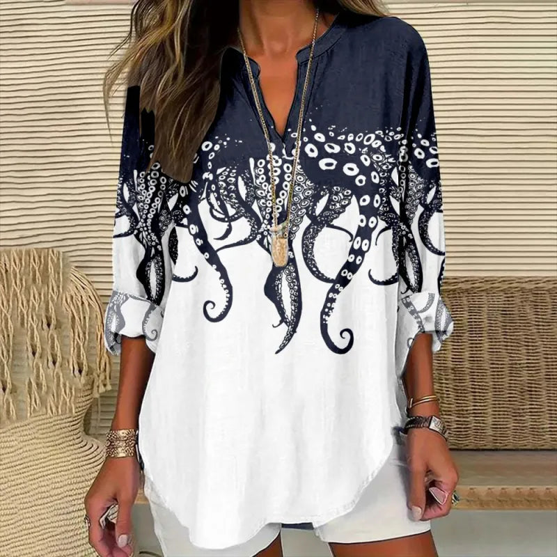 Lightweight women's relaxed fit blouse, great for spring/summer fashion, with a chic split neck and cuffed sleeves.