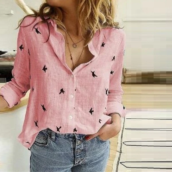 Modern women's blouse. Relaxed fit long sleeve button-down top offering comfort for work or casual outings.