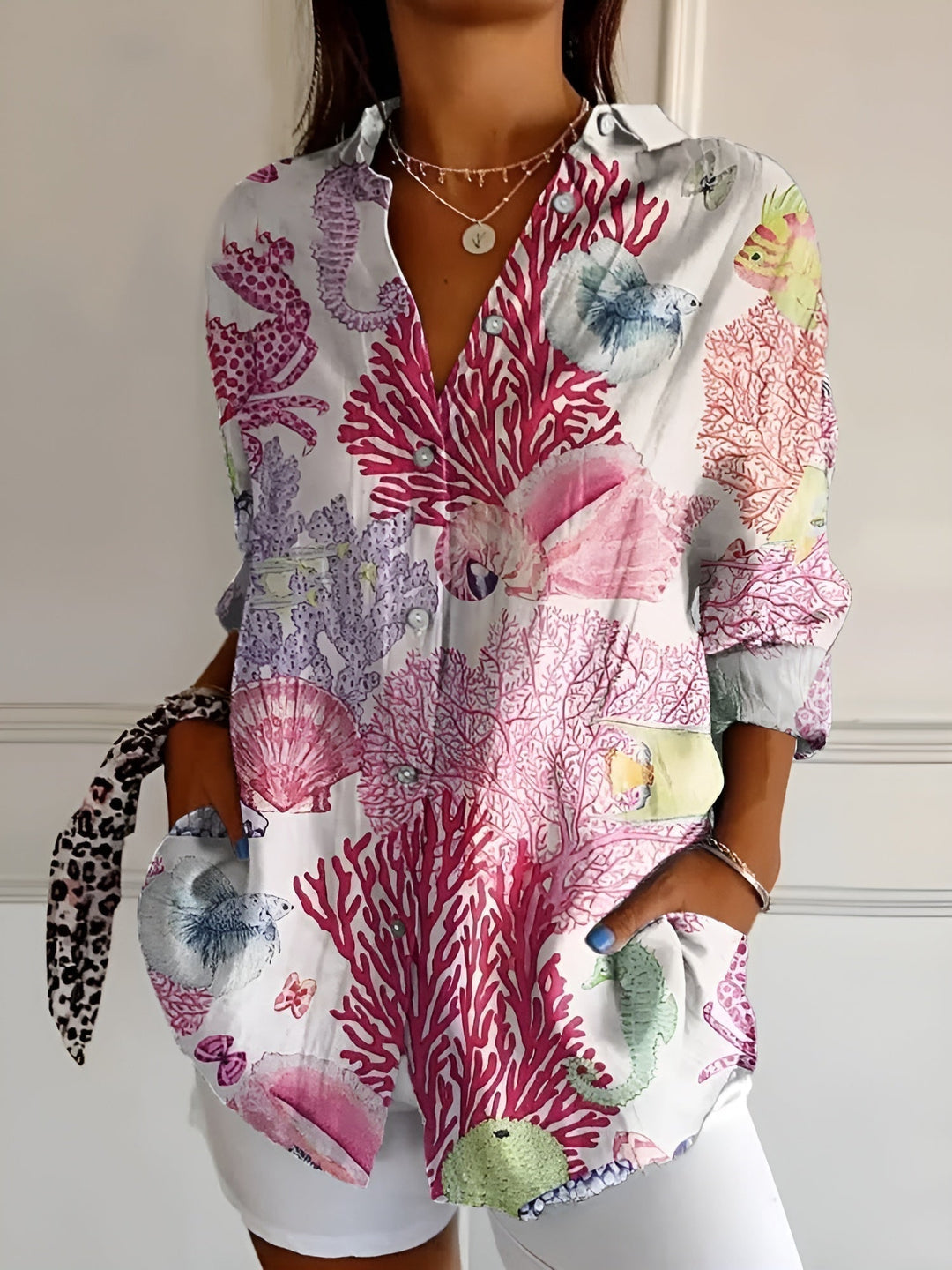 Effortless women's relaxed fit button-down long-sleeve blouse, a stylish all-season top for comfort.