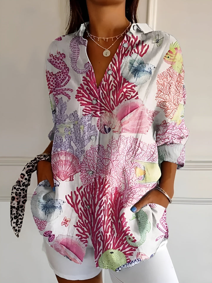Effortless women's relaxed fit button-down long-sleeve blouse, a stylish all-season top for comfort.