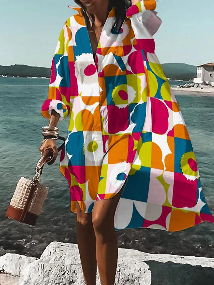Women's short sleeve button-down midi shirt dress. Relaxed fit, versatile summer and warm weather everyday wear.