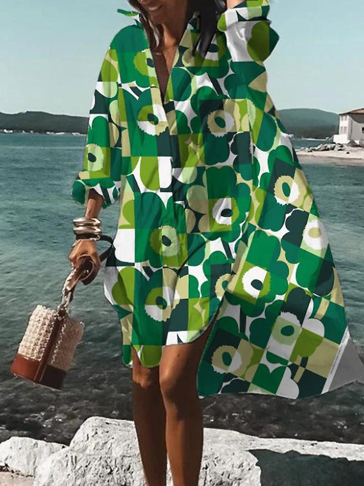 Stylish women's button-down midi shirt dress. Features short sleeves, relaxed fit, and flowy design for summer.