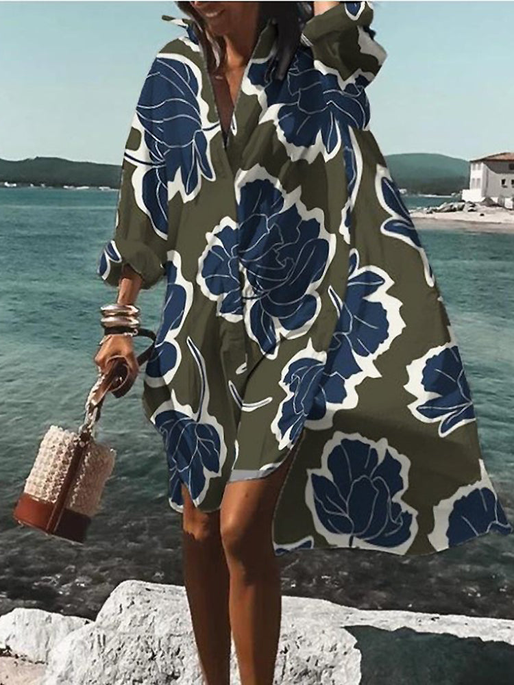 Relaxed fit short sleeve button-down midi shirt dress for women. Casual, elegant summer fashion.