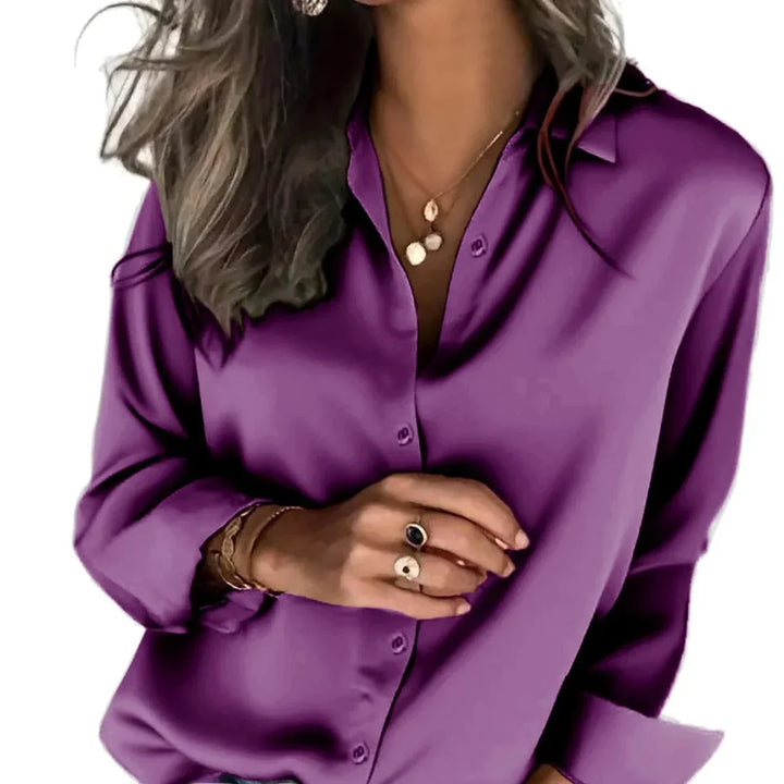 Women's relaxed fit button-down shirt in a soft fabric, perfect for casual chic or professional office wear.