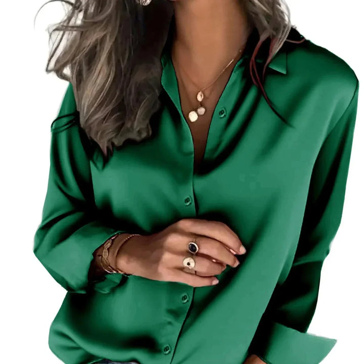 Classic button-front shirt for women, featuring a relaxed fit ideal for comfortable office wear or casual outings.