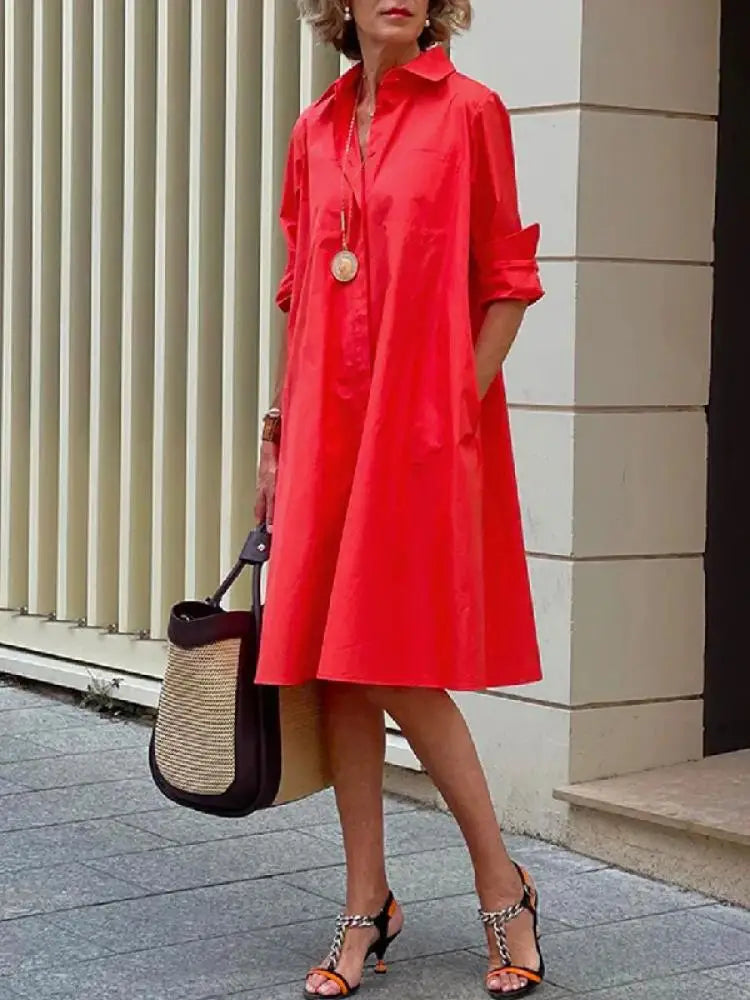 Stylish women's A-line midi shirt dress with button front, perfect for everyday style or office wear.