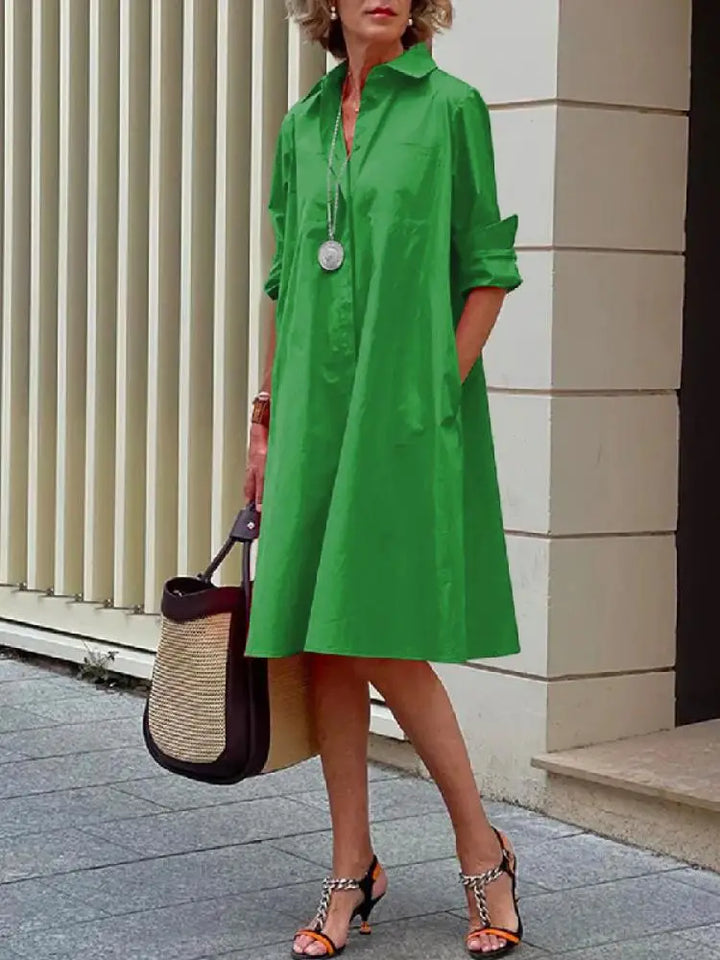 Elegant red women's relaxed fit midi shirt dress with button-front, perfect for office or a casual outing.