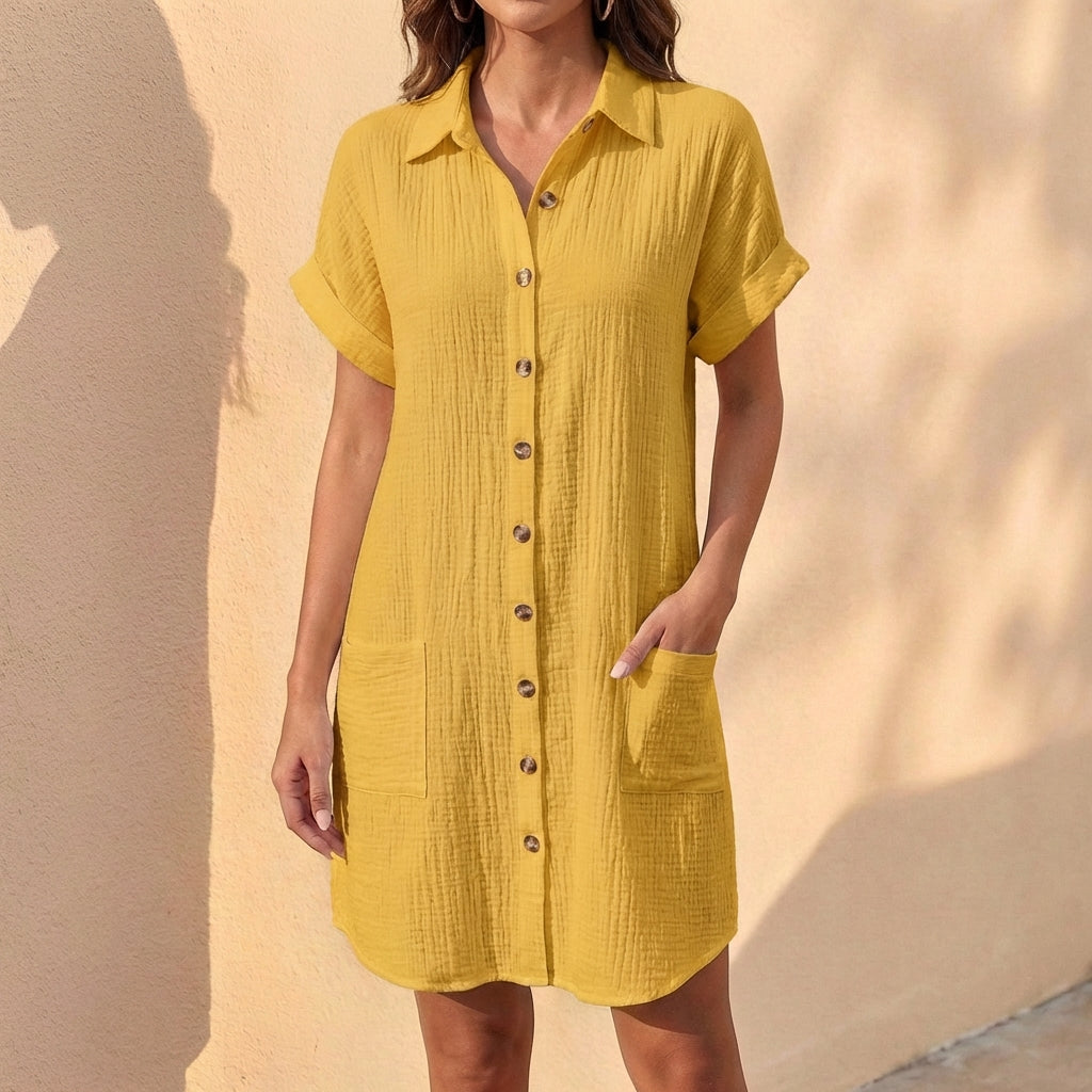 Casual women's button front midi shirt dress, ideal for summer daily wear with its relaxed fit and elegant style.