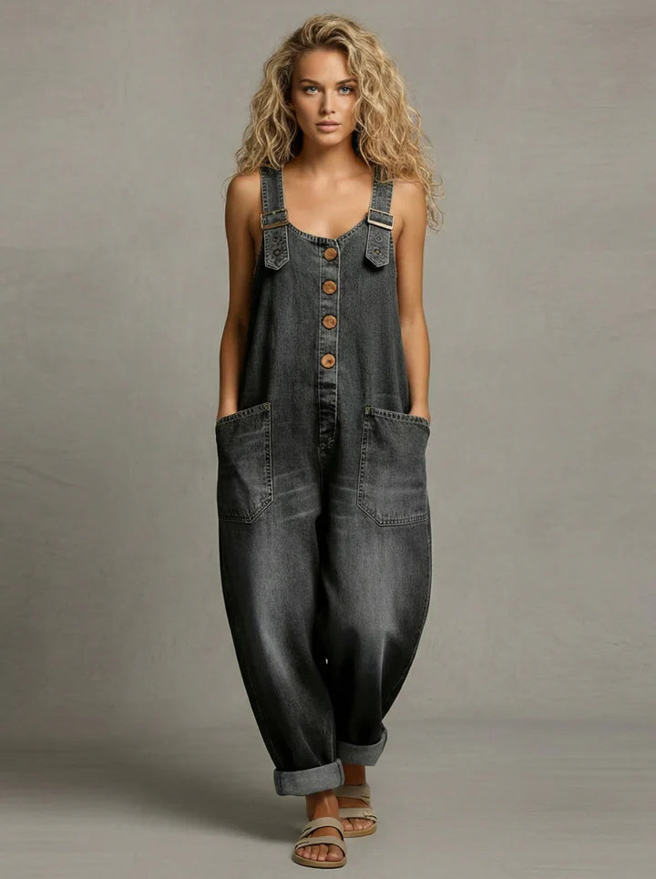 Full length women's relaxed button-front overalls with roomy patch pockets; ideal one-piece for casual style.
