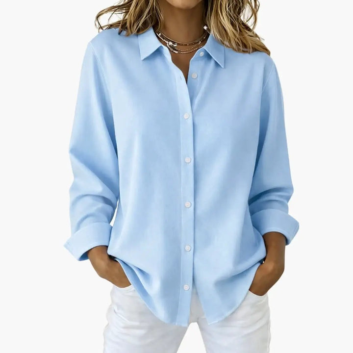 Chic women's relaxed fit button-up shirt, a stylish staple for any wardrobe.