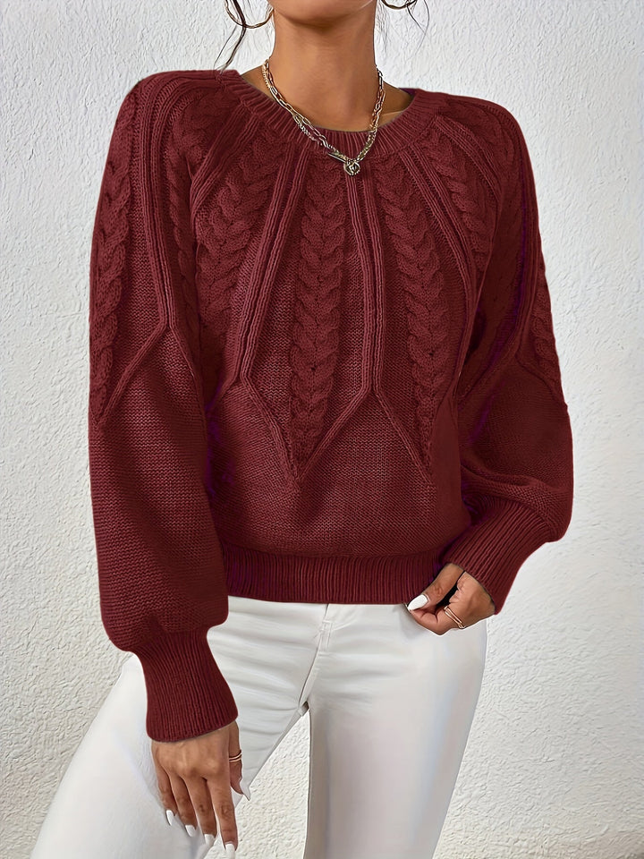Elegant women's fall sweater, relaxed fit, classic cable knit, and dramatic lantern sleeves.