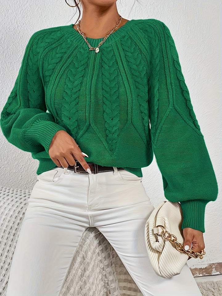 Stylish women's cable knit sweater, relaxed fit for comfort, with beautiful lantern sleeves.