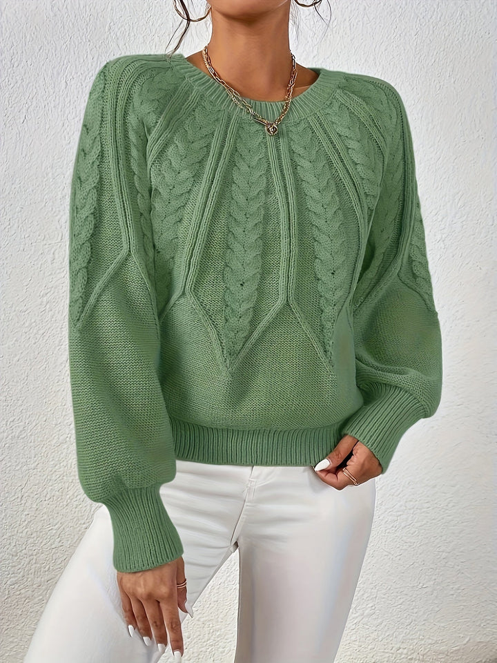 Cozy women's long sleeve cable knit sweater, relaxed fit with distinctive lantern sleeves for winter.
