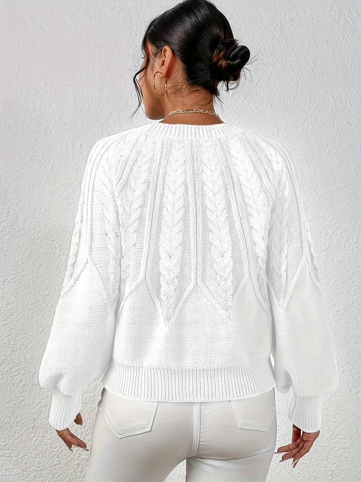 Women's chic cable knit sweater, relaxed fit and elegant lantern sleeves for any occasion.