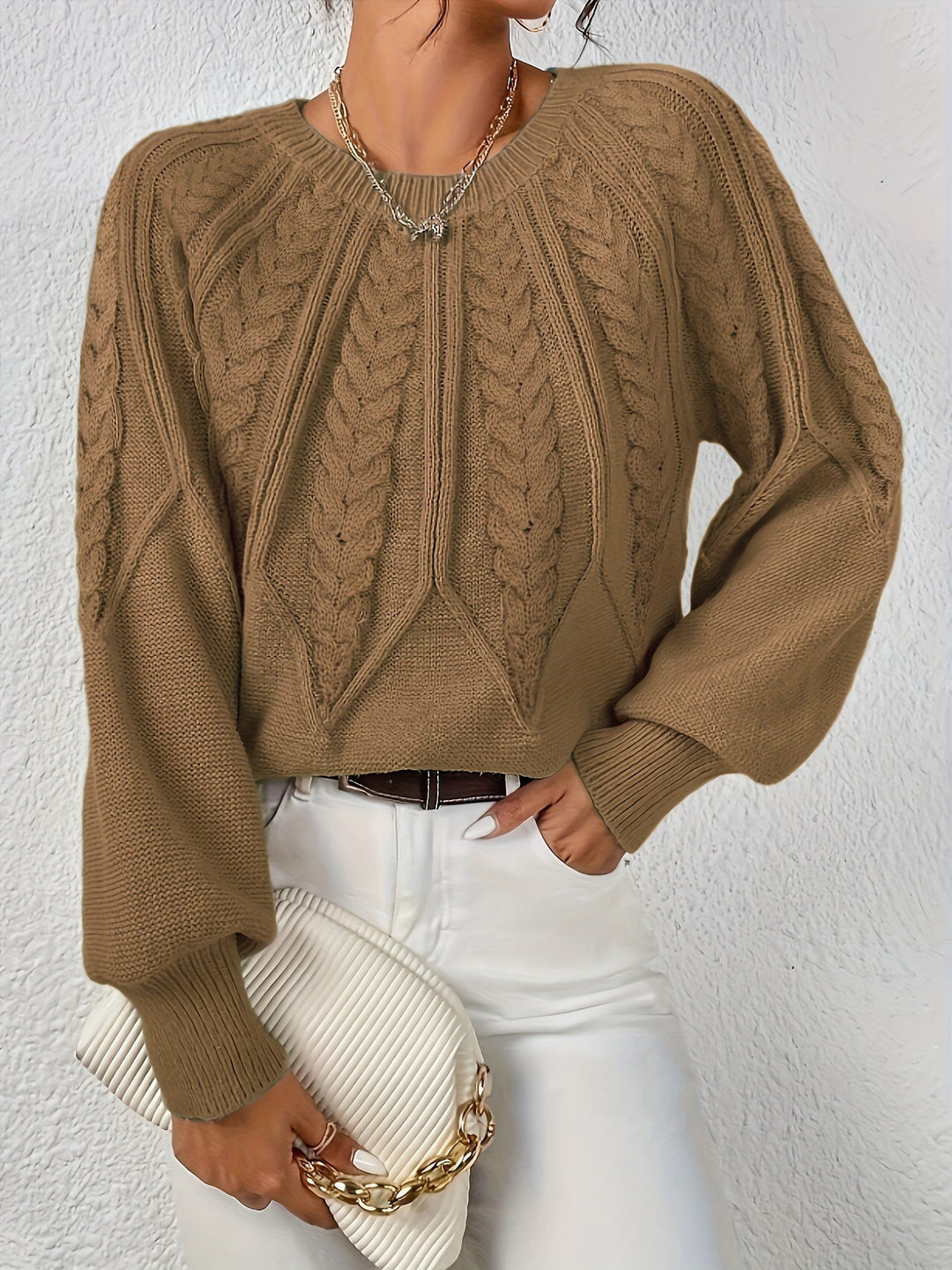 Women's everyday wear cable knit sweater, relaxed fit, and beautiful lantern sleeves.