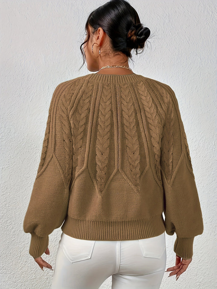 Women's stylish relaxed fit sweater, cozy cable knit design, and elegant lantern sleeves.