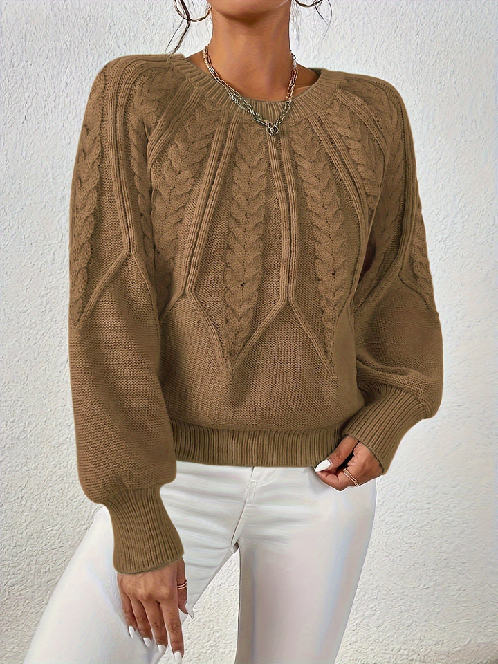 Women's relaxed fit knit top, classic cable stitch, and trendy lantern sleeves for fall.