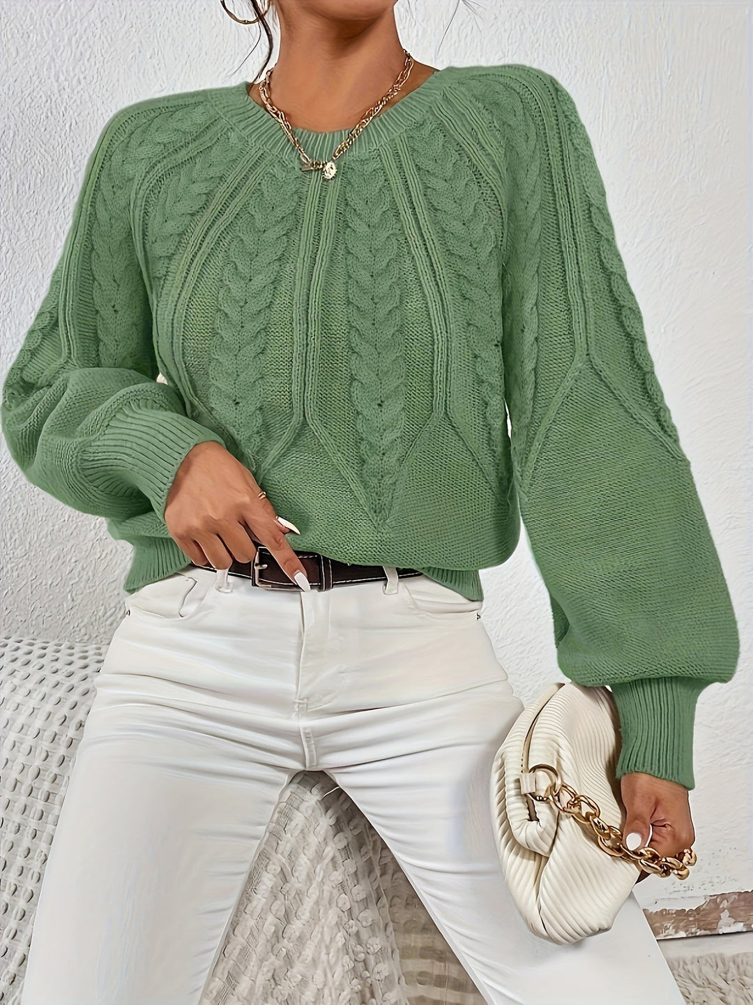 Everyday women's relaxed fit sweater, cable knit texture and fashionable lantern sleeves.