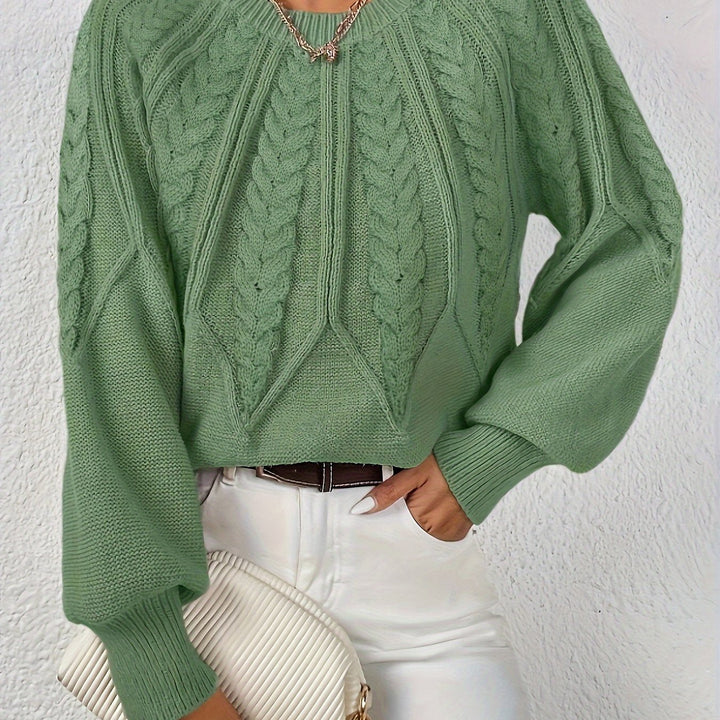 Women's casual fall sweater, relaxed fit, soft cable knit texture, and lantern sleeves.